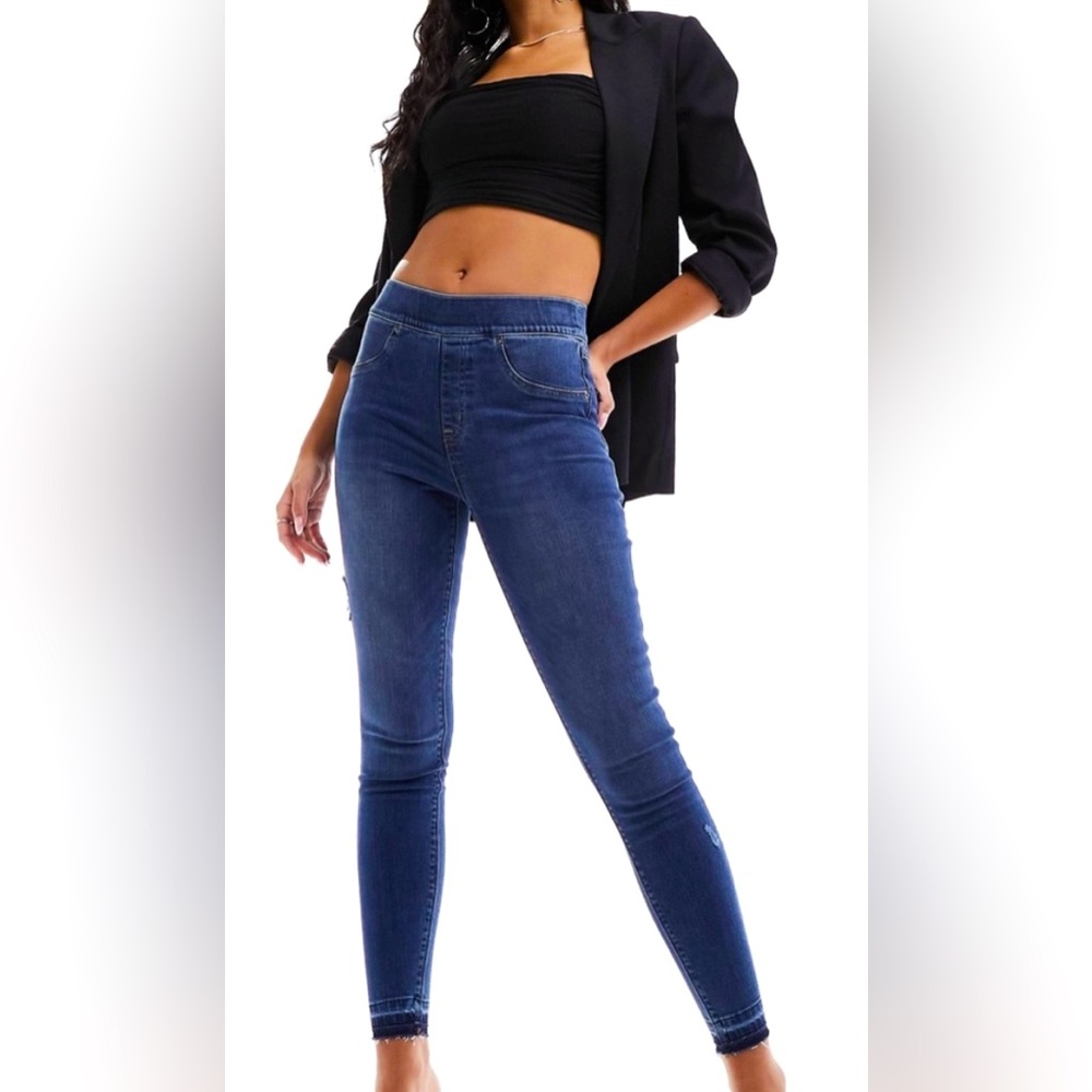 Spanx shape and lift distressed skinny jeans in medium wash blue color